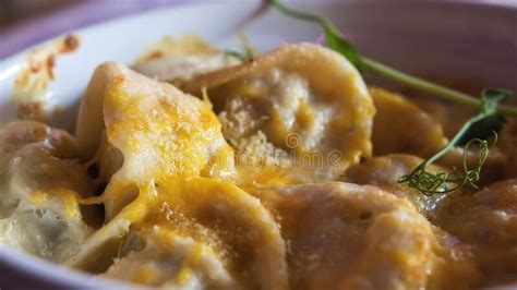 Delicious Dumplings With Chicken And Ground Beef Baked With Cheese