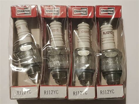 Set Of Four New Champion Rj Yc Stock Spark Plugs Abc Spares