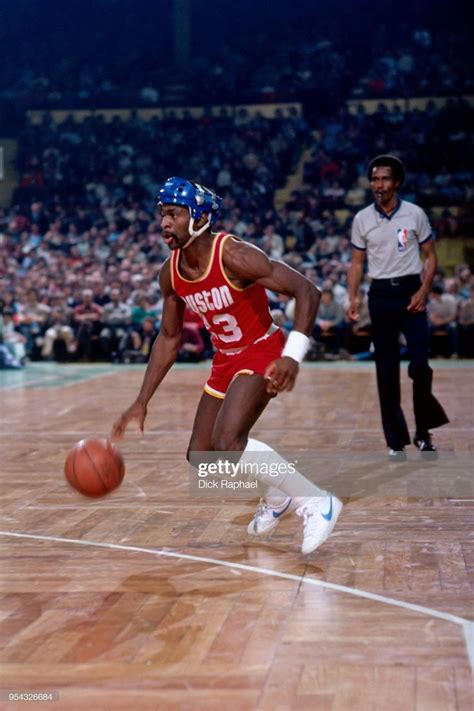 Calvin Murphy of the Houston Rockets handles the ball against the...