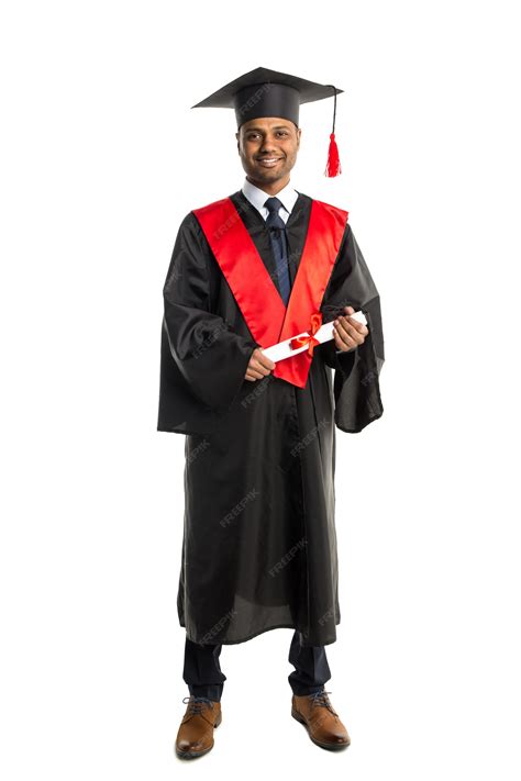 Premium Photo Male African American Graduate In Gown And Cap