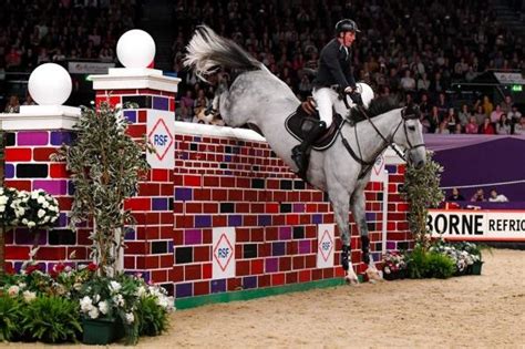 Williams And Whitaker Clear 7ft2in For Hoys Puissance Honours Horse