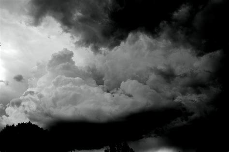 A black and white photograph of storm clouds | Black and white clouds ...