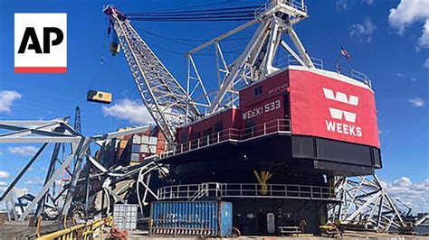 Salvage Crews Begin Removing Containers From Ship That Collapsed