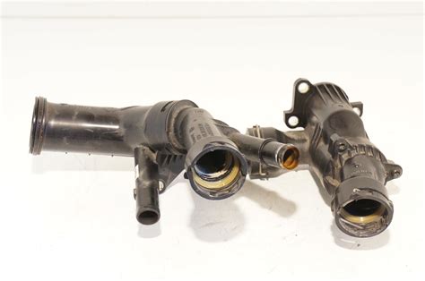 OBUDOWA TERMOSTATU AUDI VW SEAT SKODA 1 6 TDI 04L121111Q 04L121026AF Za