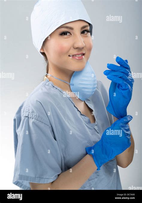 Female Medic Wearing Surgical Scrubs Cap And Mask Stock Photo Alamy