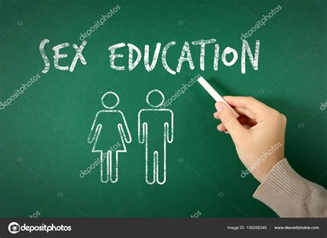 Sex Education Concept Woman Writing On Blackboard Closeup Stock Photo