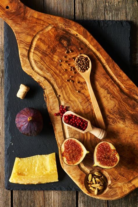 Olive Wood Cutting Board With Spices And Fig Stock Image Image Of