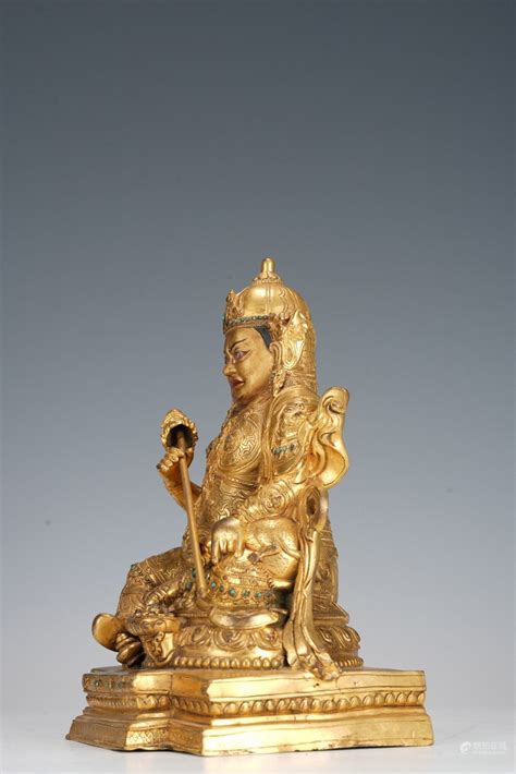 51BidLive Tibetan 18th C Gilt Bronze Statue Jambhala With Inlays