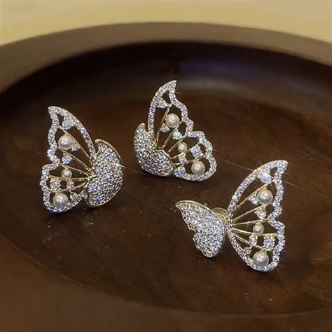 Korean Pearl And Cubic Zirconia Studded Double Sided Butterfly Stud