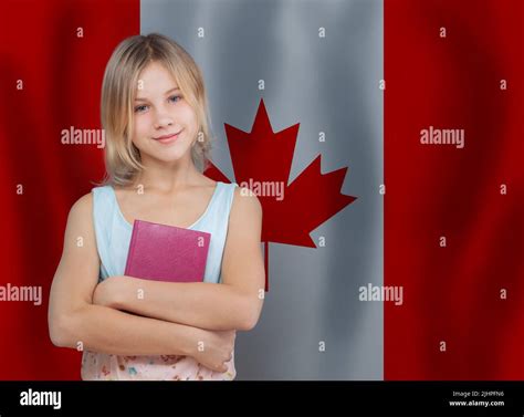 Pretty Teen Girl Holding English Book Against Canadian Flag Background