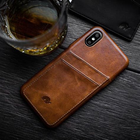 Bullstrap® Portfolio iPhone Case in Sienna, Ocean, and Black Colors