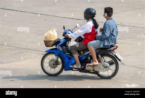 Samut Prakan Thailand Apr A Woman Rides Boy On A Motorcycle