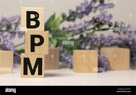 BPM Business Process Management Written On A Wooden Cube In A Office