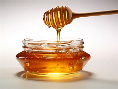 Premium Ai Image Fresh Sweet Honeycomb And Wooden Honey Dripping Isolated