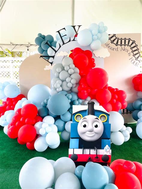 A Thomas The Tank Engine Birthday Party With Balloons