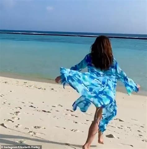 Elizabeth Hurley Shows Off Her Phenomenal Figure In A Tiny Red Bikini Daily Mail Online