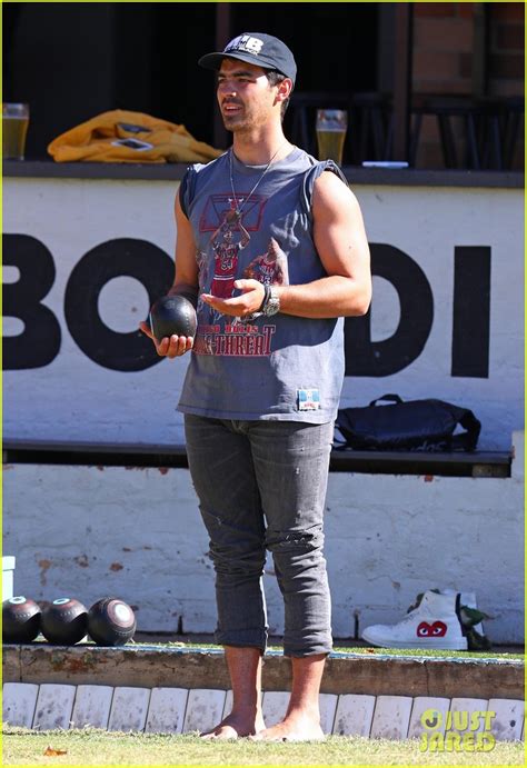 Full Sized Photo Of Nick Jonas Joe Jonas Flaunt Buff Biceps Playing