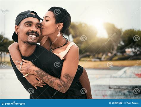 Black Couple Hug And Cheek Kiss In City Affection Or Bonding Together