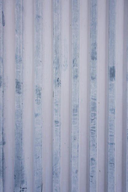 Premium Photo Iron Corrugated Fence Closeup Painted With White Paint