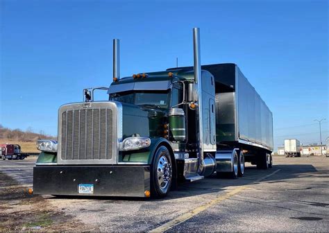 A Large Semi Truck Parked In A Parking Lot