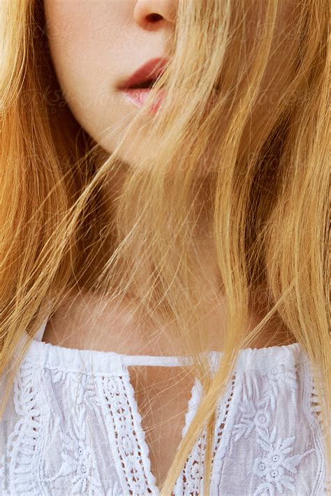 Blond Hair Over The Face Closeup By Stocksy Contributor Sonja Lekovic Stocksy