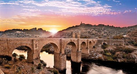 The Alc Ntara Bridge Is A Roman Stone Arch Bridge Spanning The Tagus