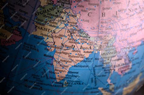 Premium Photo | Political Indian map on a classroom globe closeup