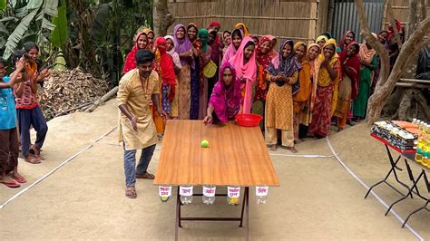 টেবিলে বল গড়িয়ে চাল তেল আটা চিনি জেতার কঠিন চ্যালেঞ্জ। নতুন গ্রামের