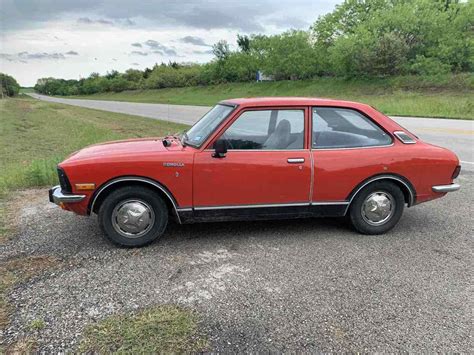 Toyota Corolla Sedan Red Rwd Manual Deluxe For Sale Photos