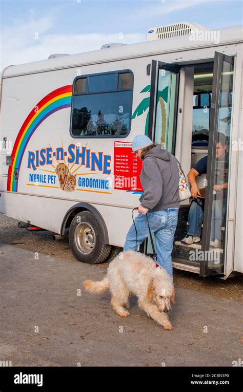 A Mobile Pet Grooming Vehicle In The Parking Lot Of The 40 Acre Off