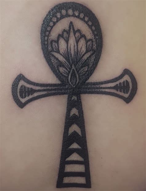 Egyptian ankh and lotus tattoo Ire Katuless at Blue Cat Tattoo in ...