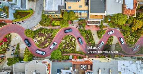 Aerial Straight Down Over Lombard Street With Cars And Road Running