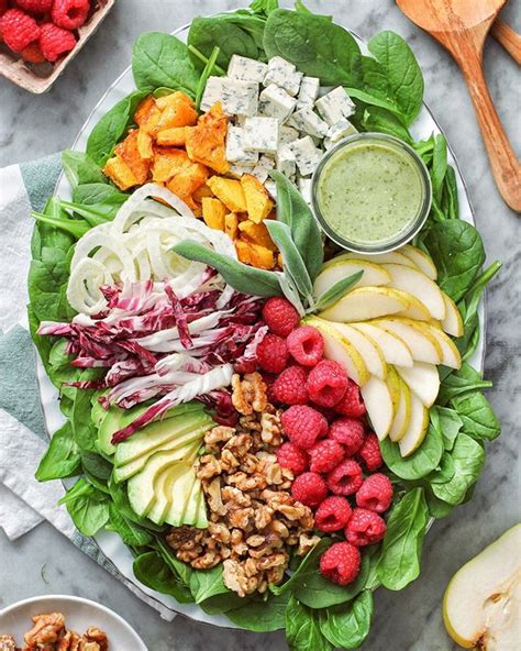 Baby Spinach Fall Salad With Fresh Raspberries And Kale Tahini Dressing