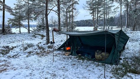 Hot Tent Winter Solo Overnighter At A Frozen Lake Surrounded By Snow