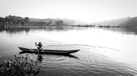 Premium Photo | The old man and the lake in black white