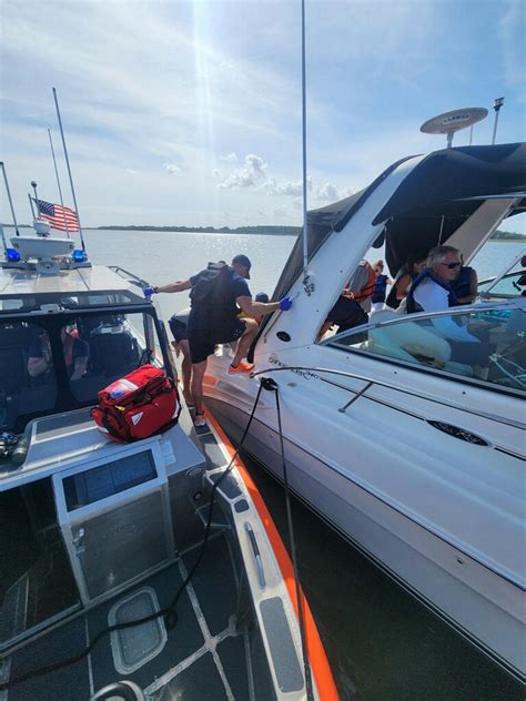 PHOTO RELEASE Coast Guard Partner Agencies Assist 8 After Vessel Runs