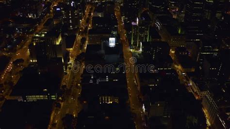 Drone Night And Building With Lights In City For Urban Metropolis Or