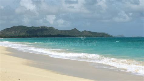 Remote Beach in Oahu, Hawaii with an Island View Stock Photo - Image of ...