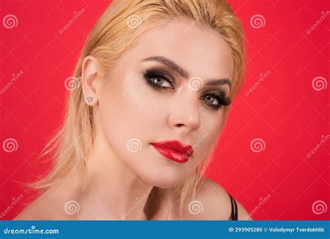 Beauty Woman With Fashion Eyes Make Up Red Lipstick On Plump Lips