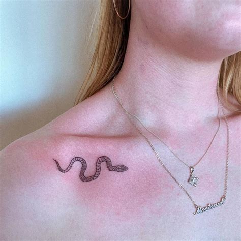 Fine Line Snake Tattoo On Collarbone