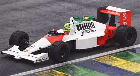 Lewis Hamilton Drives Ayrton Senna S Legendary Mclaren At Brazilian