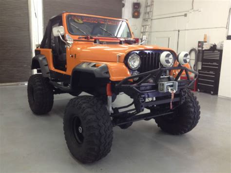 AMC CJ7 JEEP WRANGLER CJ 7 LIFTED 16 INCHES NEW 304 V8 HARD TOP AND DOORS