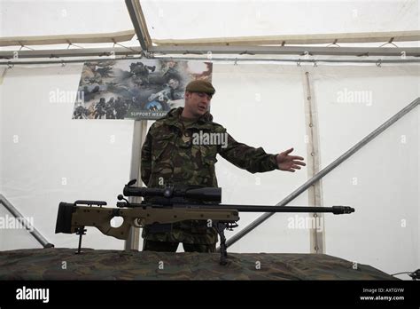 British Army Infantry soldiers demonstrate their newest L115A3 sniper ...