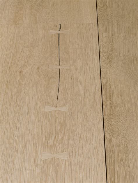 Dinesen floors. A Close-up of butterfly joints in a Heart Oak floor. Timeless craftmanship. Wood ...