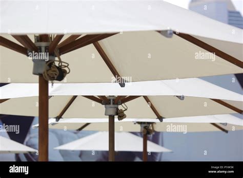Closeup Of White Beach Umbrella As Background Stock Photo Alamy