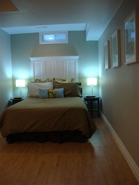 Clean Simple Basement Guest Bedroom Headboard Blue Green Basement