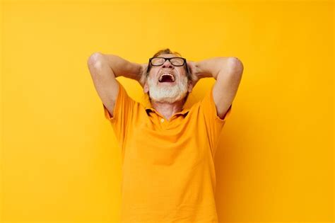 Premium Photo Senior Greyhaired Man Wearing Glasses Yellow Shirt