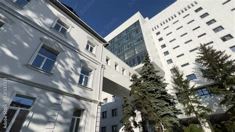 Hospital Exterior With Transition Between Buildings Bottom Up View Of