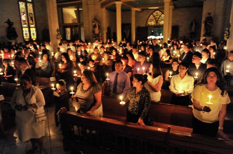 New Catholics Prepare For Easter Vigil Ceremony