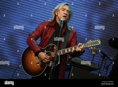 Member Of Fhe Rock Band Eagles Joe Walsh Performs On Stage At The